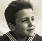 Ausschnitt eines Fotos von einem Kind, nur das Gesicht ist gut zu erkennen